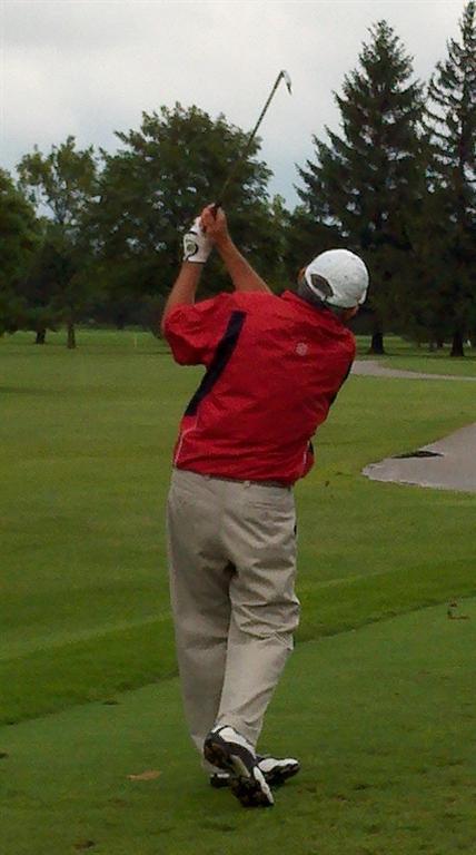 Tom Rezler puts one of his patented swings on an iron shot during Sunday's rainsoaked event.&nbsp; Tom has played in the senior tournament and regular tournament longer than anyone in the field.&nbsp; Thank you Tom for you support and competitiveness.&nbsp;  